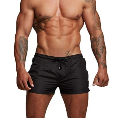 Imagen de TMEOG Bañador Hombre Corto, Pantalon Corto Deporte Traje de Baño Shorts Deportivos Natacion Surf Playa Calções Banho Homem con Bolsillo Cremallera(M,Negro)