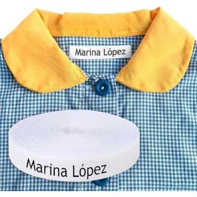 Imagen de 200 Etiquetas para Ropa personalizadas con nombre planchar. Cinta termoadhesiva guarderías, escuelas, colegios y residencias de ancianos. certificado ecológico.