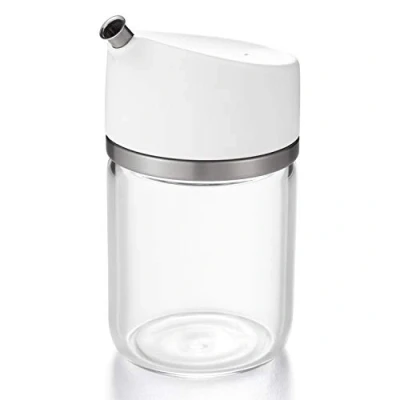Imagen de OXO Good Grips Aceitera de cristal con dosificador un tamaño 150 ml remates acero inoxidable, transparente