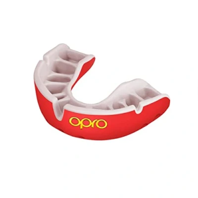 Imagen de OPRO protector bucal Gold Level, deportivo para niños, con tecnología de ajuste revolucionaria boxeo, lacrosse, MMA, artes marciales, hockey, BJJ (Rojo, Joven)