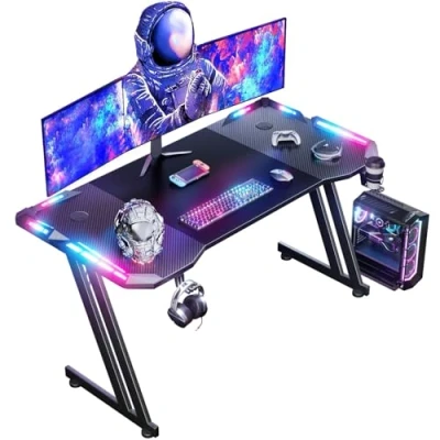 Imagen de HLONONE 120 x 60cm LED Mesa Gaming, Escritorio Gaming de Fibra Carbono Ergonómicas, Gamer con Portavasos y Gancho para Auriculares, Negro