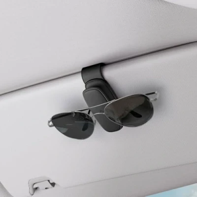 Imagen de Spigen Tesla Model y 3 2024 Highland 2025 Universal [Clip de Silicona], Soporte para Gafas Sol Parasol Coche Accesorios, Compatible con BMW, Etc Paquete 2, Negro
