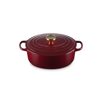 Imagen de Le Creuset Signature 21178279494441 Cacerola ovalada de hierro fundido esmaltado con tapa, 27 cm, 4,1 L, granate