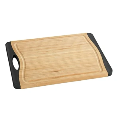 Imagen de WENKO tabla de cortar bambú M+, antideslizante cocina, con surco goteo para líquidos y asa, cuidando el filo los cuchillos Marrón