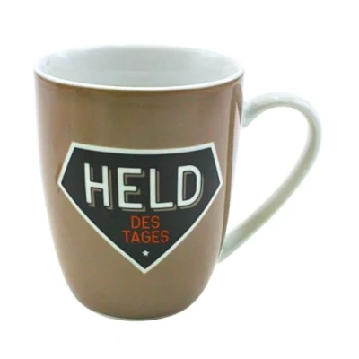 Imagen de Dekohelden24 Taza de café porcelana con diseño héroe del día. Dimensiones: 9,8 x 8,2 cm, capacidad 250 ml, apta para lavavajillas.