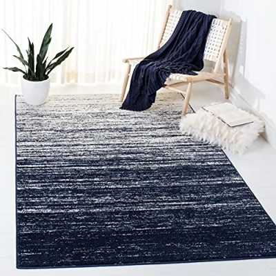 Imagen de Safavieh Alfombra Moderna en degradé para salón, Comedor, Dormitorio, colección Adirondack, Pelo Corto, Azul Marino y Marfil, 91 x 152 cm