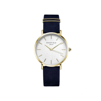 Imagen de Rosefield Reloj Mujer The West Village de Oro: Caja Redonda 33 mm con Esfera Blanca y Correa Azul WBUG W70