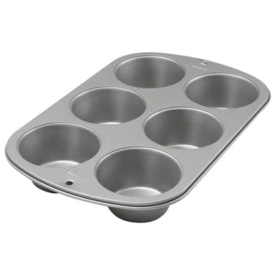 Imagen de Wilton Molde para magdalenas Jumbo con receta correcta, antiadherente, 6 agujeros, 4.7cmx22.3cmx34.3 cm