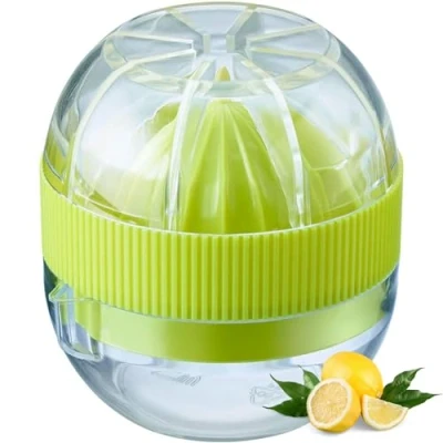 Imagen de Westmark Pequeño Exprimidor de cítricos con recipiente y tapa, Diámetro: 7,2 cm, Capacidad: 50 ml, Plástico, Fresh and Fruity, Transparente/verde, 30932280