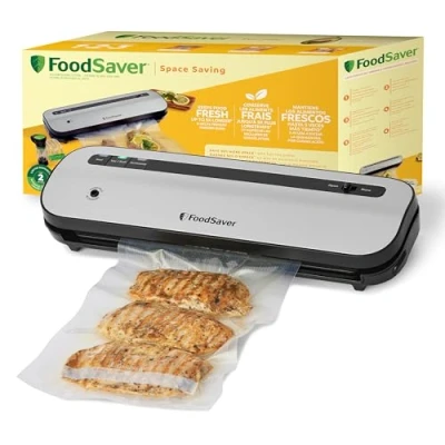 Imagen de Selladora al vacío FoodSaver Mantiene el alimento fresco hasta 5 veces más* Ahorra un 50% más espacio** 1 rollo (28cm x 2,43m), 2 bolsas de sellado (0,94L), con cierre (0,94L) VS1290X