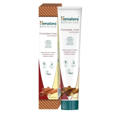 Imagen de Pasta de dientes a base hierbas Himalaya Botanique Complete Care con certificación Ecocert Cosmos Natural, sabor canela, combate la placa, refresca el aliento, sin flúor, 75 ml
