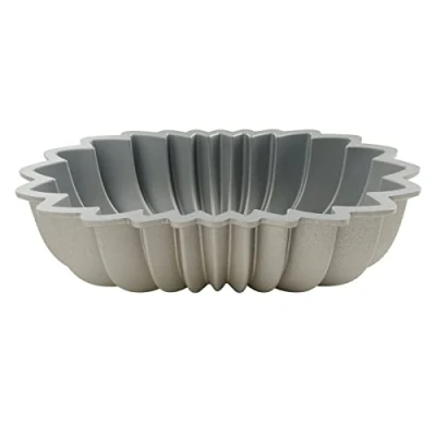 Imagen de DR OETKER Molde para bizcocho o tarta de forma ovalada y rizado en aluminio con revestimiento antiadherente resistente hasta 230ºC, cinco años garant., 26x15cm, 1ud.