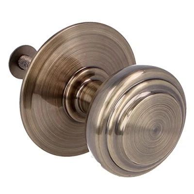 Imagen de Amig Pomo Mod. 15 de Latón Macizo Tallado con Acabado Cuero para Puertas Exteriores Entrada Diámetro Tirador Ø70 mm · Altura 77 Incluye Tornillo y Tuerca Fijación