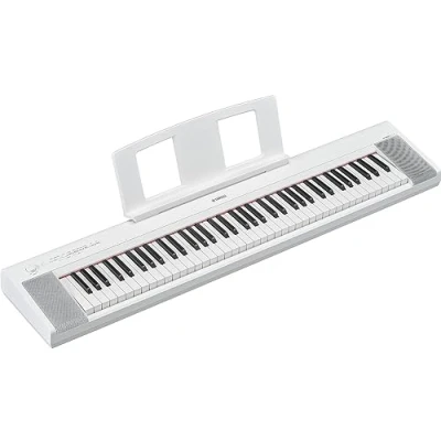 Imagen de Yamaha NP 15 Piaggero Teclado digital ligero y portátil, con 61 teclas sensibles a la pulsación voces de instrumentos