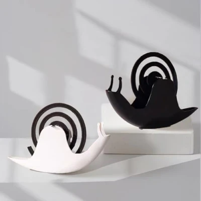 Imagen de 2 espirales de mosquitos (negro y blanco), soporte creativo para bobinas mosquitos, funciona contra insectos, incienso