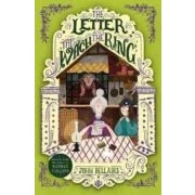 Imagen de The Letter Witch And Ring House With A Clock In Its Wall