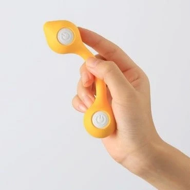 Imagen de Vibrador Tenga twin orb color amarillo y de silicona