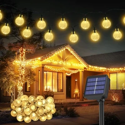 Imagen de Realky Guirnaldas Luces Exterior Solar, 8.1M 30 LED Guirnalda Solares con Función de Memoria, 8 Modos IP65 Impermeable Cadena Solar para Jardín, Patio, Navidad, Fiesta (Blanco Cálido)