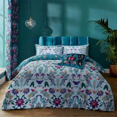 Imagen de Catherine Lansfield Mya Juego de Funda edredón Reversible con Fundas Almohada, diseño Floral Tropical, Color Azul