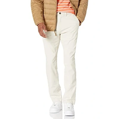 Imagen de Amazon Essentials Pantalones Chinos de Pitillo, elásticos, Informales Hombre, Piedra, 33W / 28L