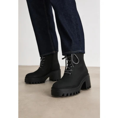 Imagen de Calvin Klein Jeans Chunky Heeled ZIP BOOT Botines con plataforma, Mujer, Talla: 38, Triple black Zapatos