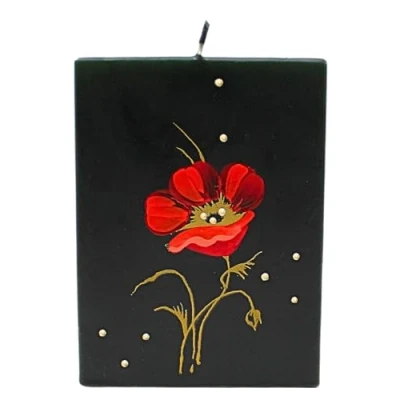 Imagen de Vela negra, hecha y pintada a mano, con orquídea roja, tamaño aprox. 9 x 5 12 cm.