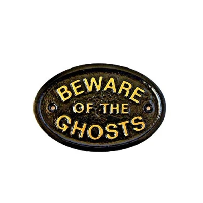 Imagen de Placa para puerta con el texto en relieve &quot;Beware of the Ghosts&quot;, color negro y dorado