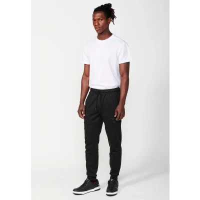 Imagen de Pantalón largo jogger con cintura engomada y bolsillos costuras en las rodillas de color negro Ropa casual