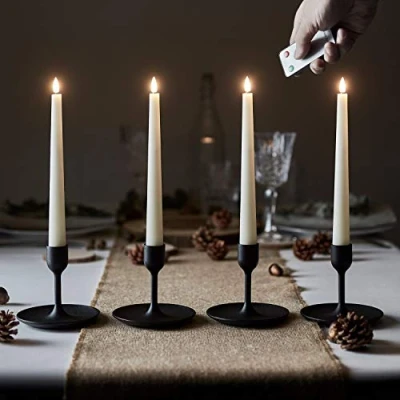 Imagen de Lights4fun Conjunto de 4 Velas LED TruGlow® a Pilas en Cera Blanca con Mecha y Llama Realista Telecomando