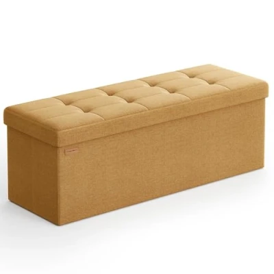Imagen de SONGMICS Mazie Colección Puff Almacenaje, Banco Plegable, 38 x 110 cm, Taburete Reposapiés, Pie de Cama, Soporta hasta 300 kg, para Sala Estar, Dormitorio, Entrada, Jengibre LSF077K04