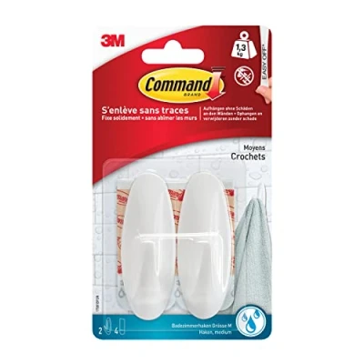 Imagen de ganchos de plástico Comando W17081, tamaño M, resistente al agua hasta 1,4 kg Diseño carga con 2 y 4 tiras blancas