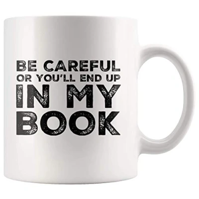 Imagen de Panvola &#039;Be Careful Or You&#039;ll End Up In My Book &#039; Escritor Autor Novelista Poeta Taza de café cerámica (11 oz)