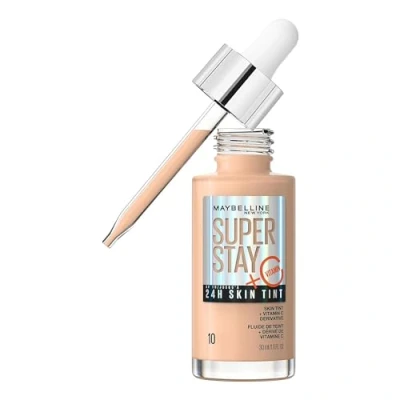 Imagen de Maybelline New York,Base de maquillaje enriquecida con Vitamina C, Hasta 24H, Acabado luminoso, Superstay Skin Tint, Tono 10