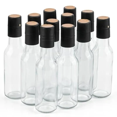 Imagen de Winter Shore Botella Cristal Pequeña con Tapa y Cápsula Retráctil de 150 ml (Pack 12) Mini Botellas Reutilizables Alcohol Botes Pequeños Vacíos para Vino, Salsa Picante, Zumo